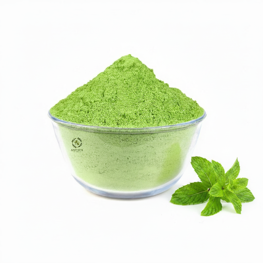 Mint Powder in a glass bowl with Anvaya Naturals logo